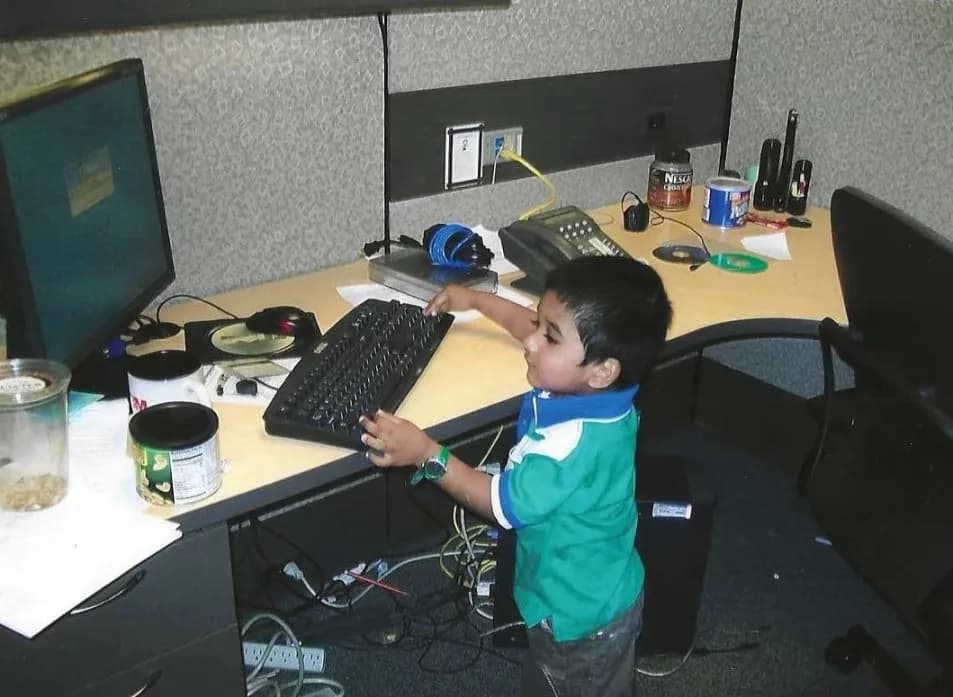 Joshua as a child at his father's office